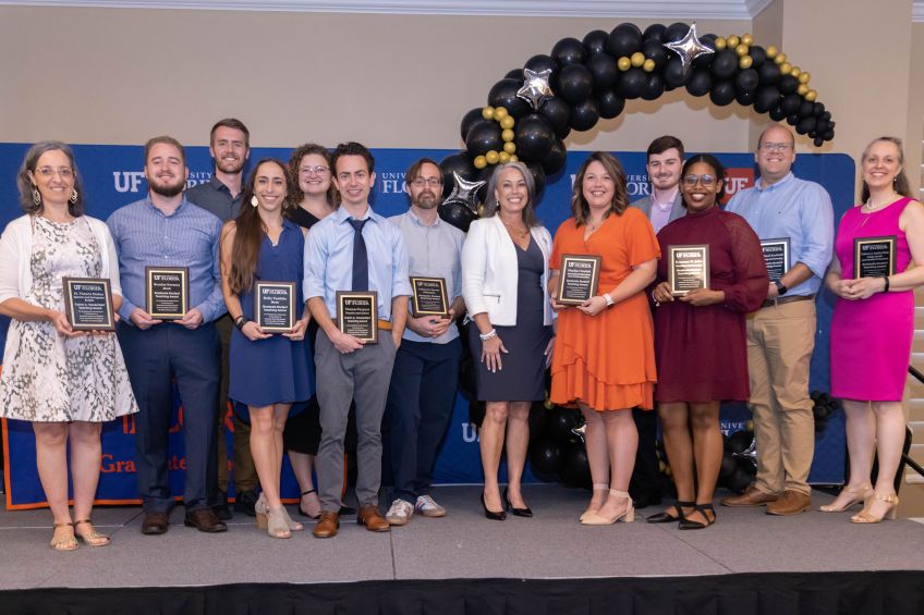 UF Graduate Student Teaching Award winners with Dean Nicole Stedman